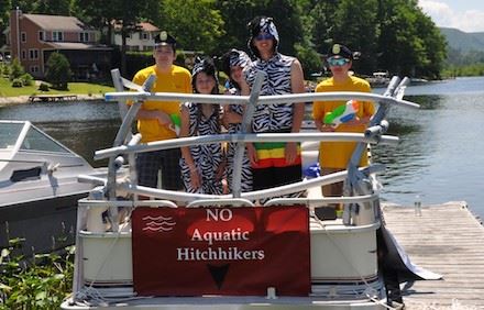 Lake St. Catherine Association Greeters participate in the boat parade.